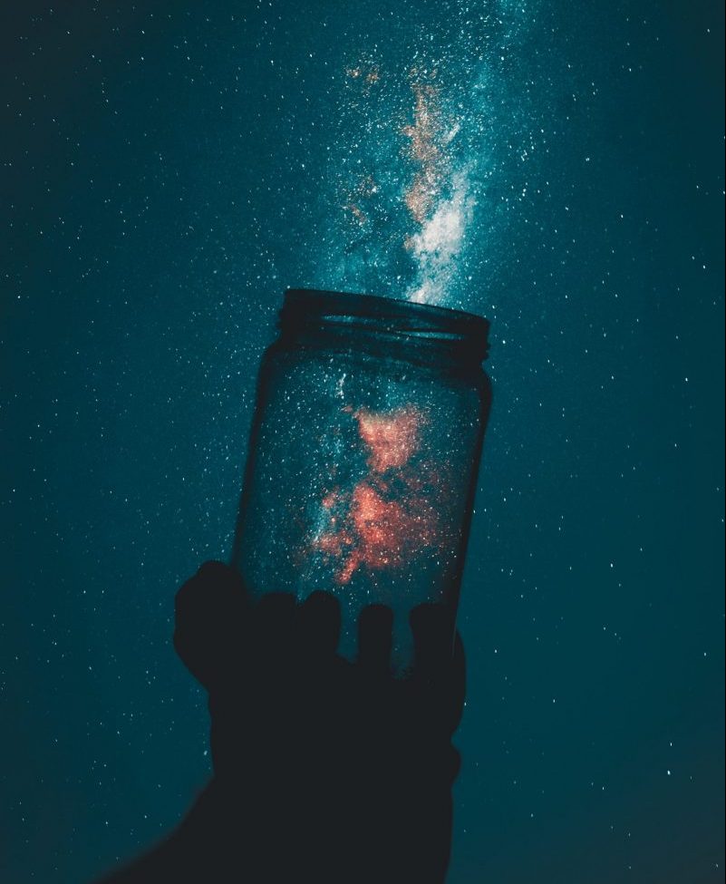 silhouette-of-person-holding-glass-mason-jar-1274260